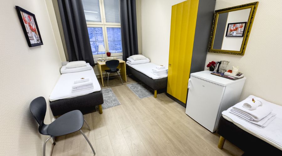 Hostelli Hermannin tilava kolmen hengen huone