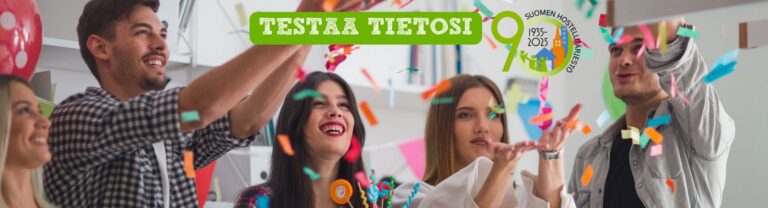 Nuoria aikuisia kakun kanssa ja heittämässä konfetteja ilmaan